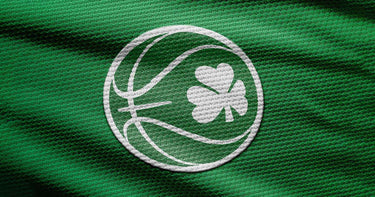 Close up of Basketball Ireland logo on a green fabric. Logo designed by Adam Ingle