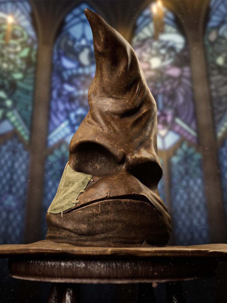 Harry Potter Brown Sorting Hat with a green leaf on a wooden stand against a stained glass window background